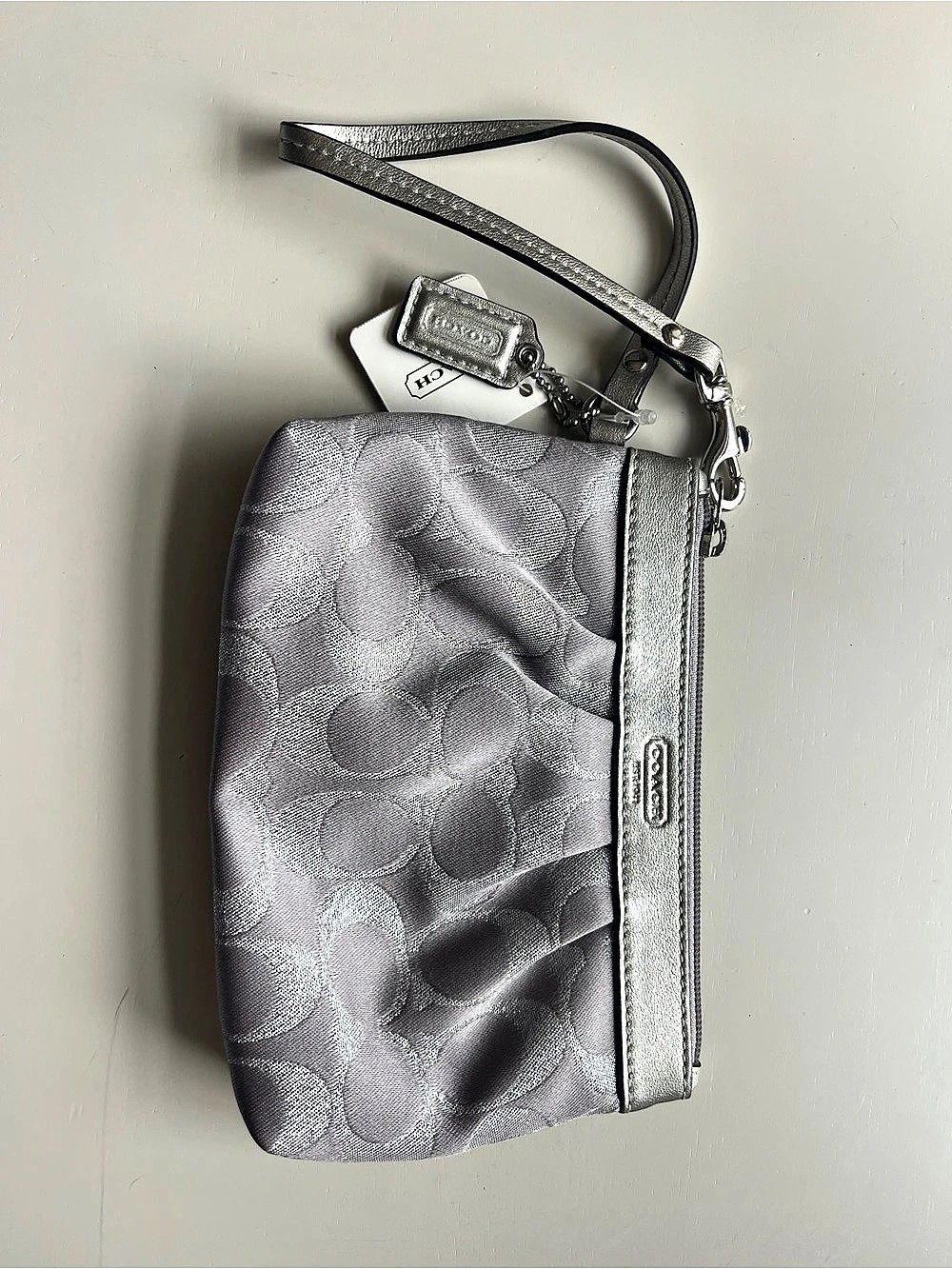 Coach Poppy Signature Pleated Wristlet Silver lavender lining. Never used with t